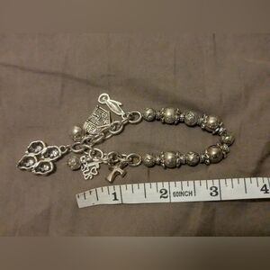 Unique charm bracelet with religious icons